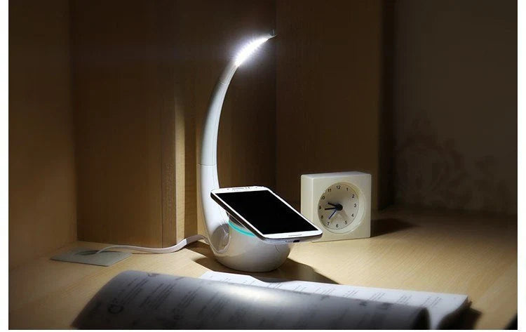 Wireless Qi charging lamp with sleek radian design, touch controls, and LED lighting