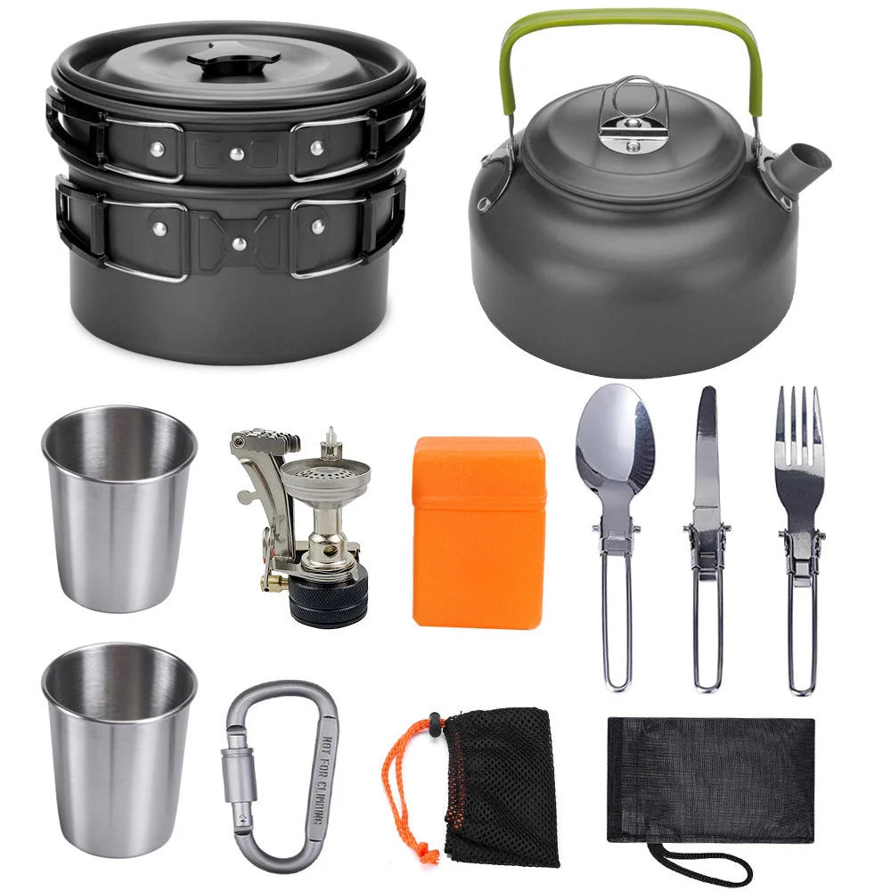 Aluminum camping cookware set with pots, pans, and utensils for outdoor cooking