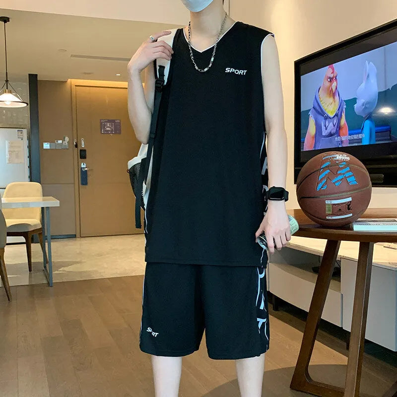 Men's white sleeveless basketball vest and matching shorts sportswear set laid flat.