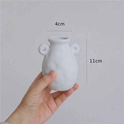 Minimalist ceramic vase set for modern home decoration, perfect for dry flower arrangements.