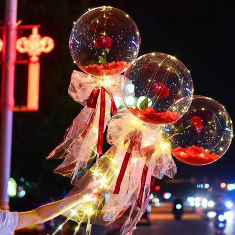 A captivating bouquet of LED-lit balloons and rose blooms, creating a mesmerizing ambiance for any celebration.