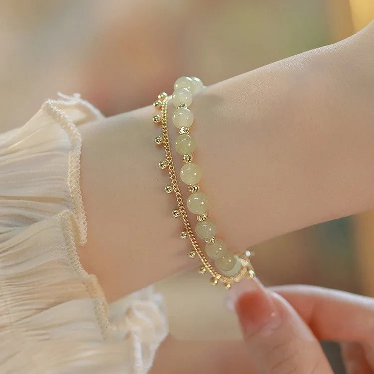 Escape Princess Natural Hetian Jade Bracelet showing beaded design with Princess Running elements