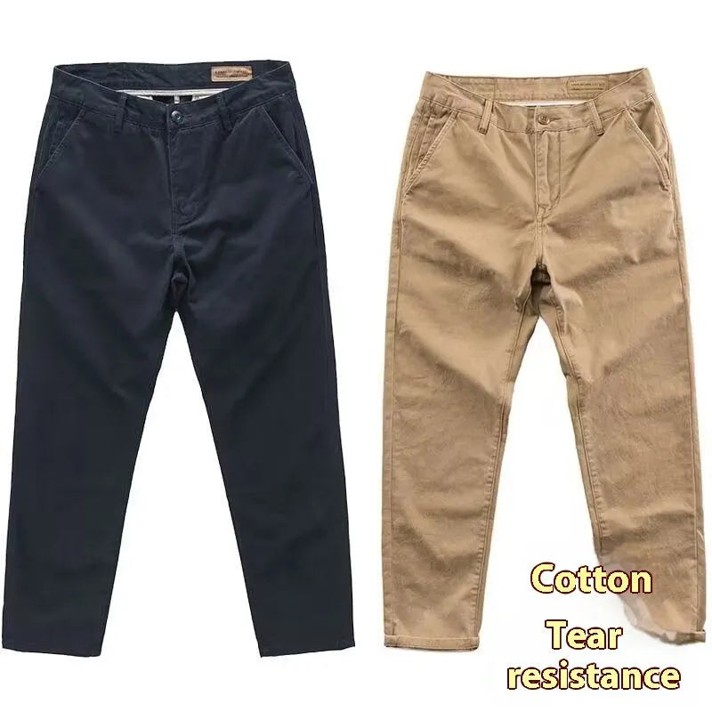 Men's slim-fit casual trousers in black with an elastic waistband and straight-leg cut.