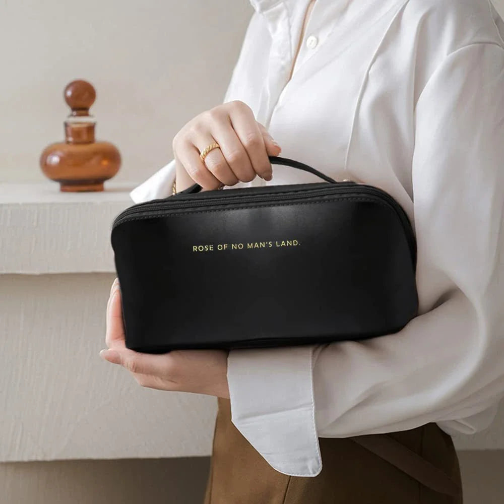 Premium PU leather travel cosmetic bag with large capacity, multiple compartments, and a sturdy wire frame for structured organization