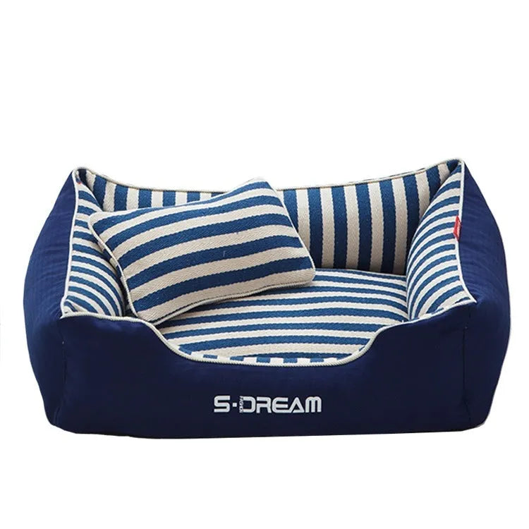 Navy striped washable dog kennel mat with a removable cover and a matching mini pillow.