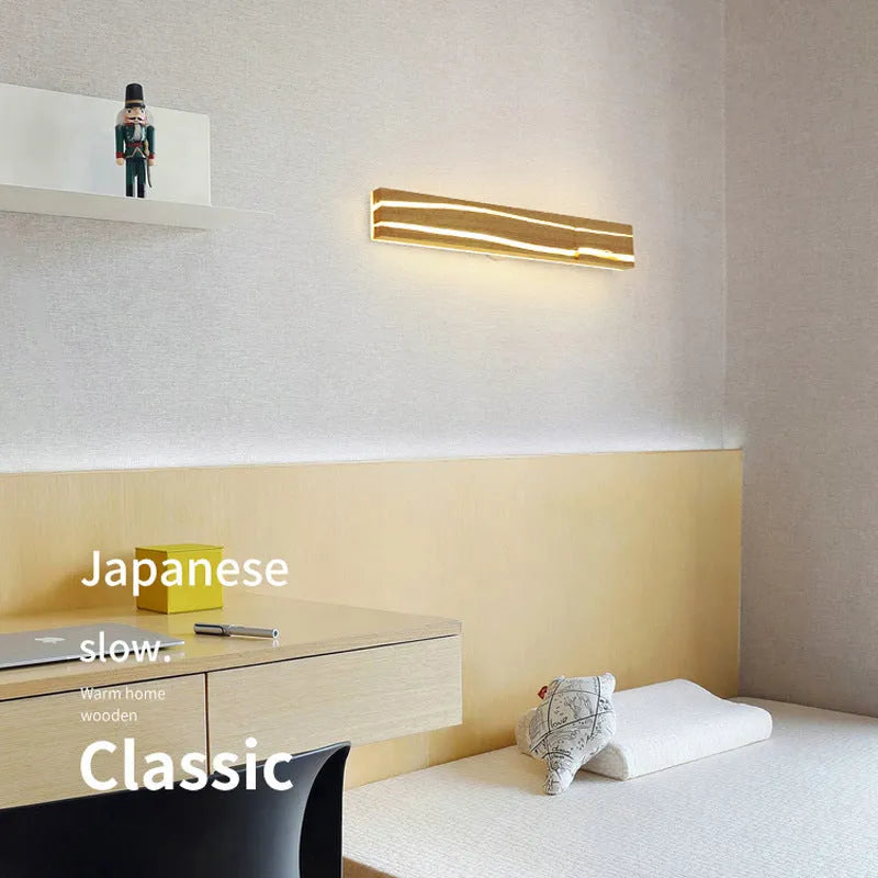 Solid wood bedroom LED wall light in log colour with rubber wood and acrylic construction