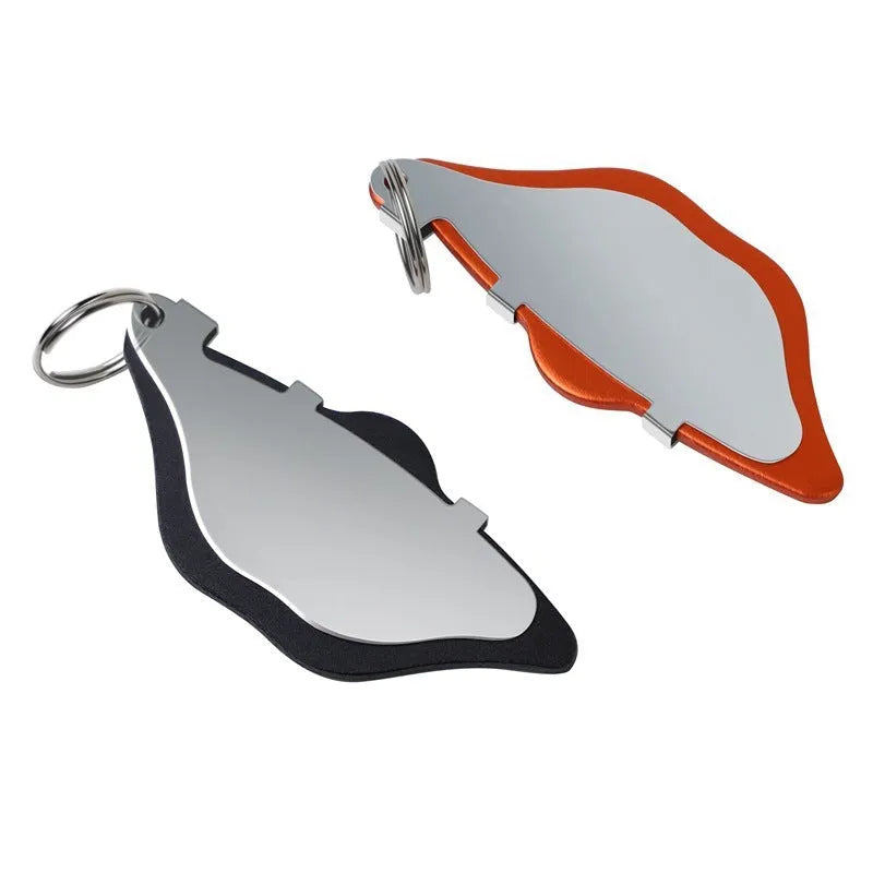 Mountain bike disc brake pads in black and orange with scratch-resistant metal construction