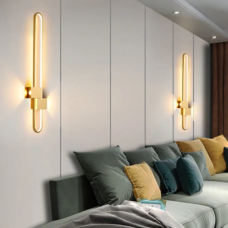 Round modern wall lamp with iron shade in gold or black finish options