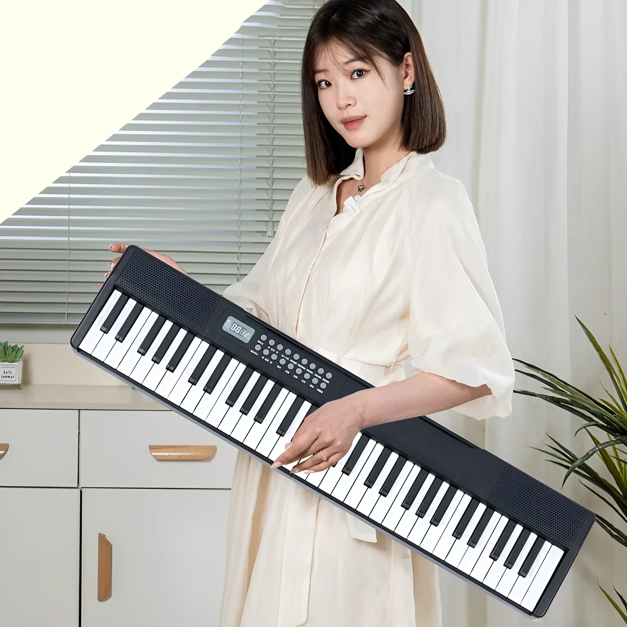Charging portable smart folding 61 key piano, plastic body, 80.6 cm length, black colour option
