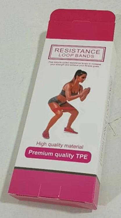 Set of five colour-coded resistance bands for yoga and fitness training, with storage bag