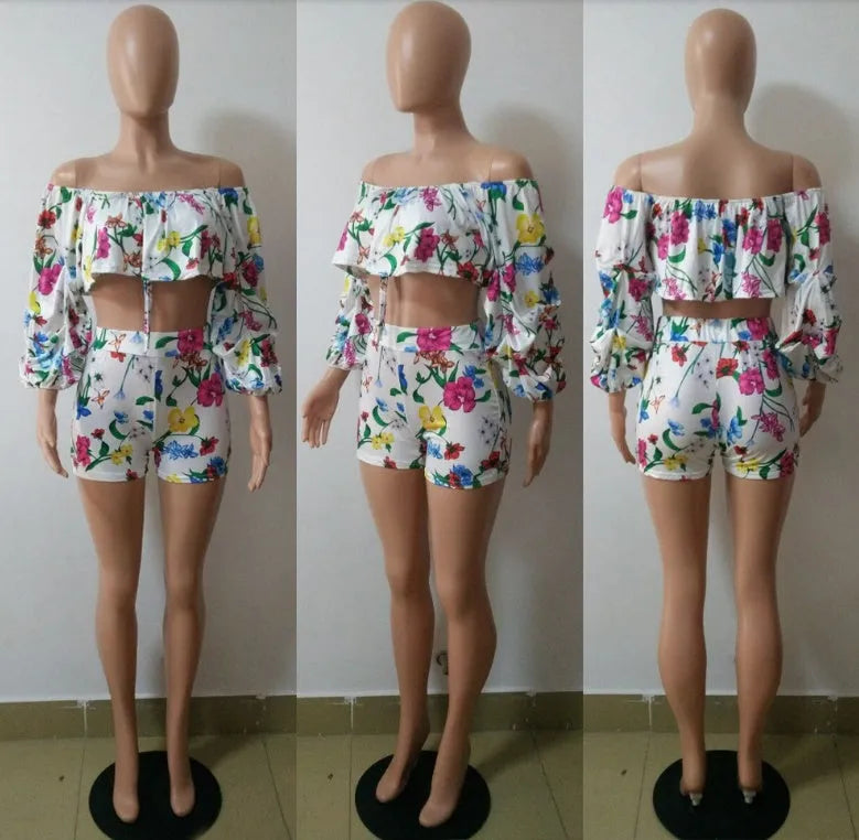 Women's multicolour digital print two-piece playsuit with fluffy pile sleeves and matching shorts.