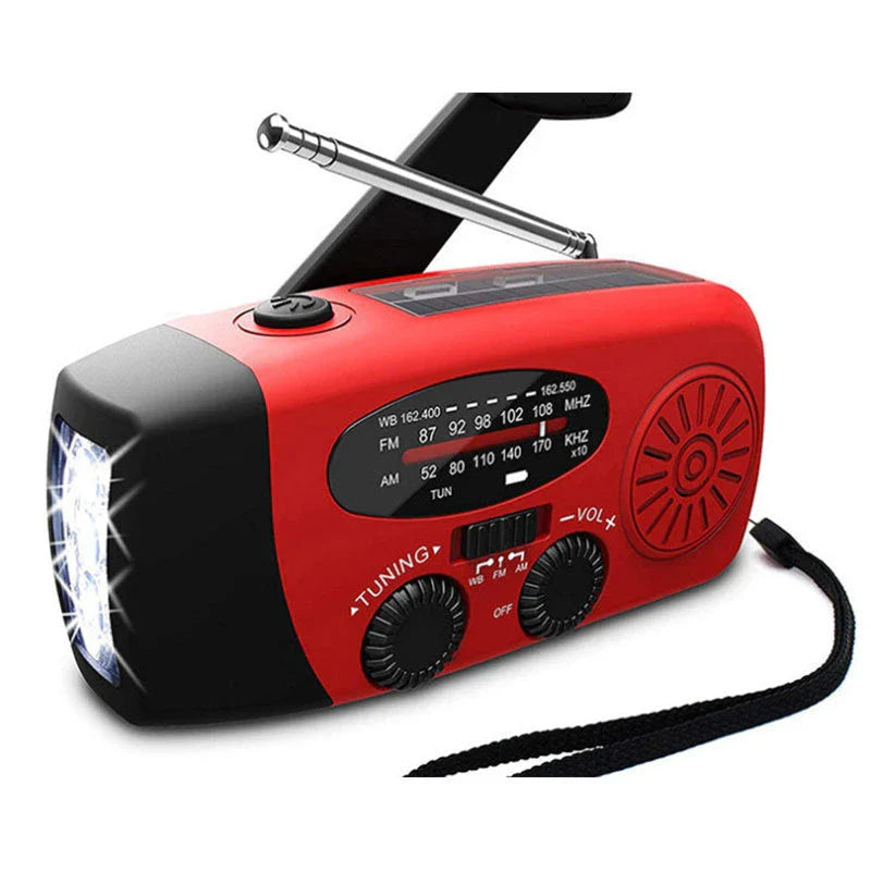 Red solar hand crank USB charging radio flashlight with AM/FM radio and LED light