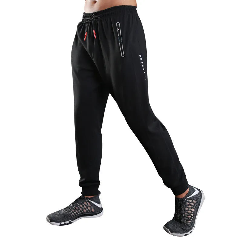 Grey and Royal Blue polyester fitness trousers with elastic waist for training and casual wear