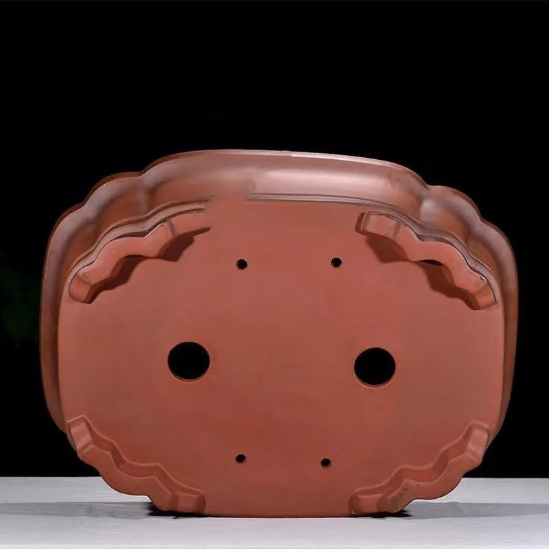 Large antique finish purple clay flowerpot with carved tree stump design featuring pine, cypress, pomegranate, golden marble and crabapple motifs