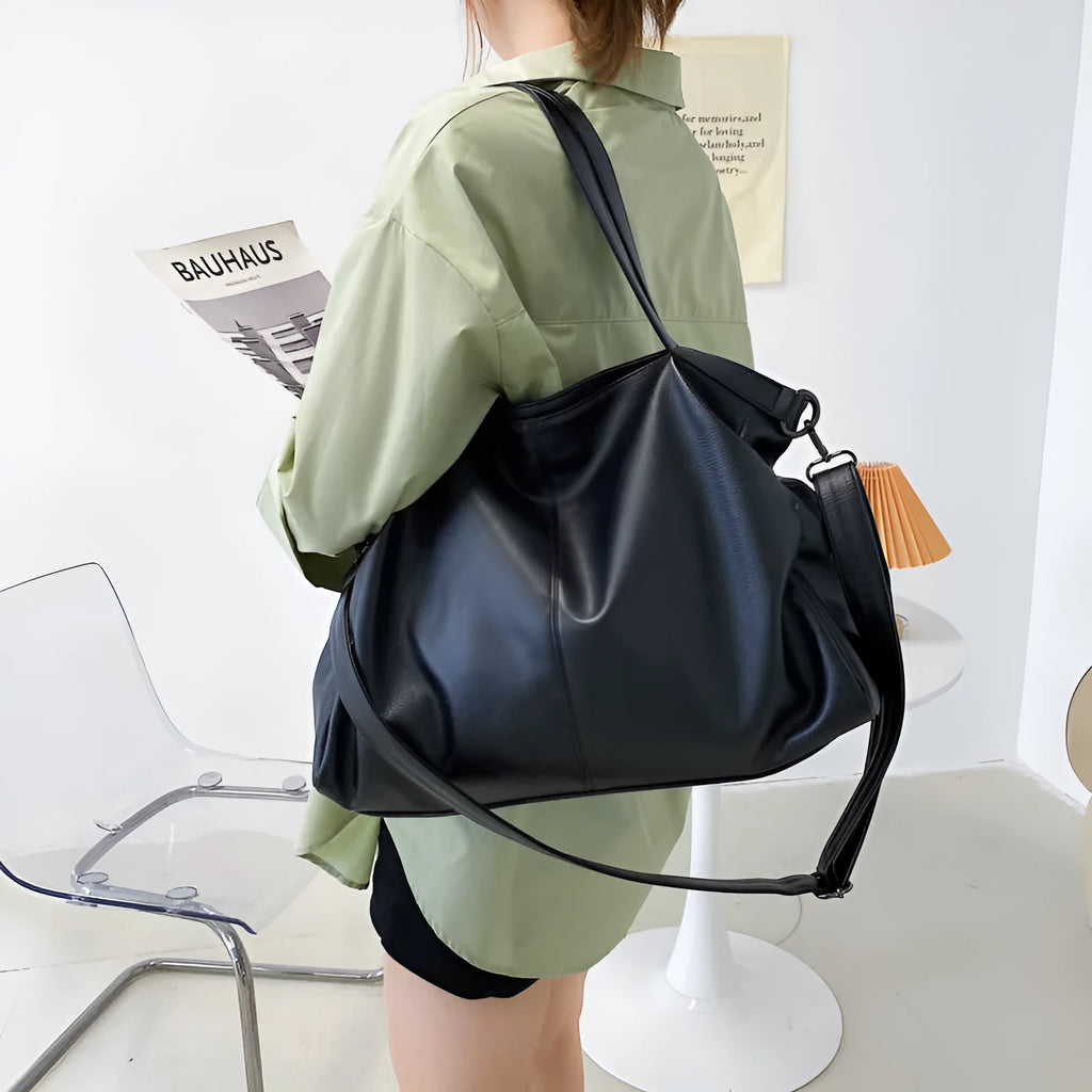 Large soft-surface PU messenger tote bag in a choice of colours, showing internal pockets and adjustable shoulder strap.