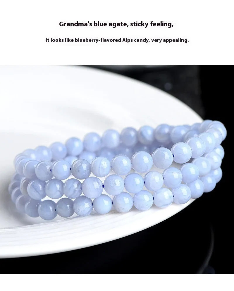 Original unisex blue agate beaded bracelet with natural striped patterns and ruyi elements.