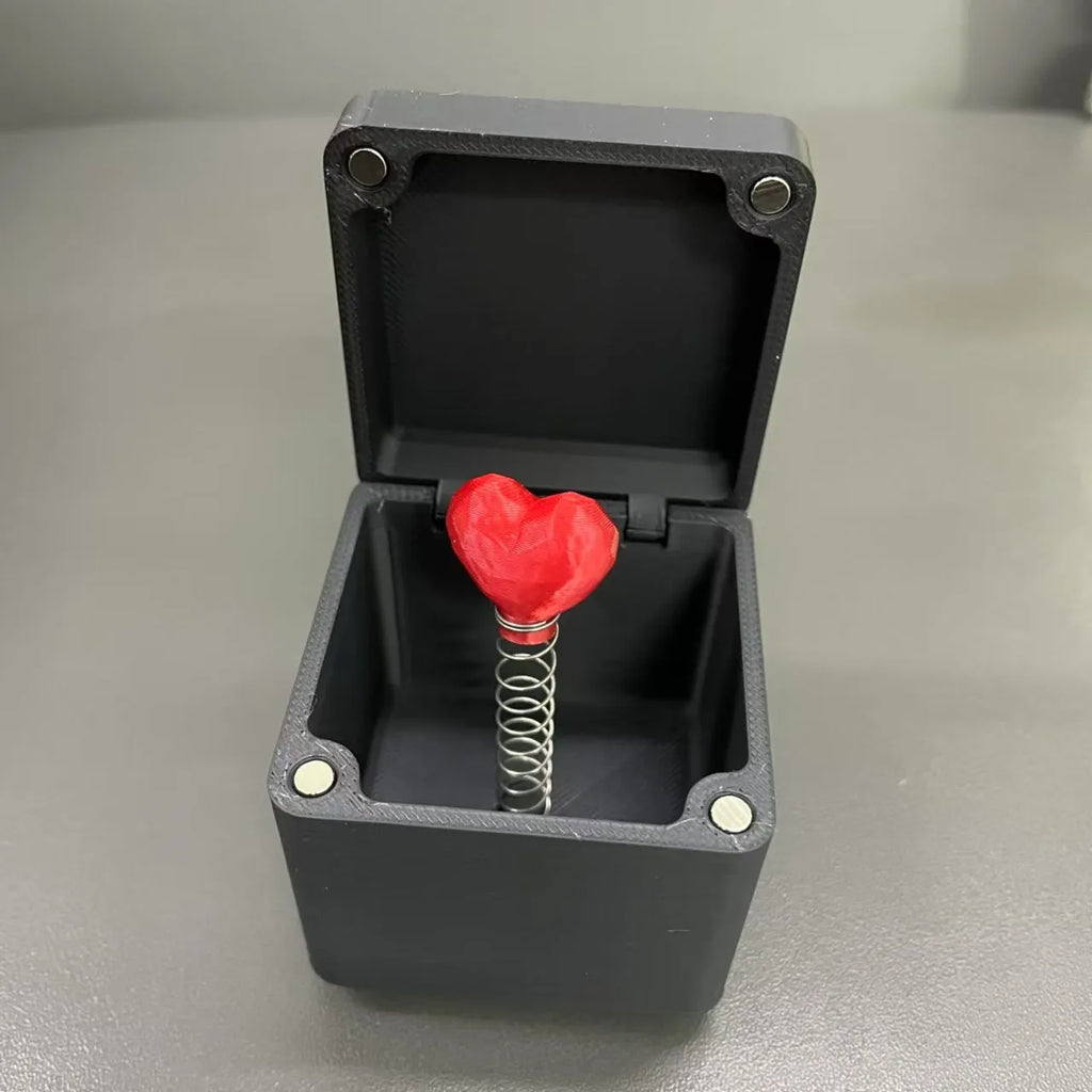 Christmas spoof middle finger gift box, 5x5cm plastic novelty toy in multiple colour options