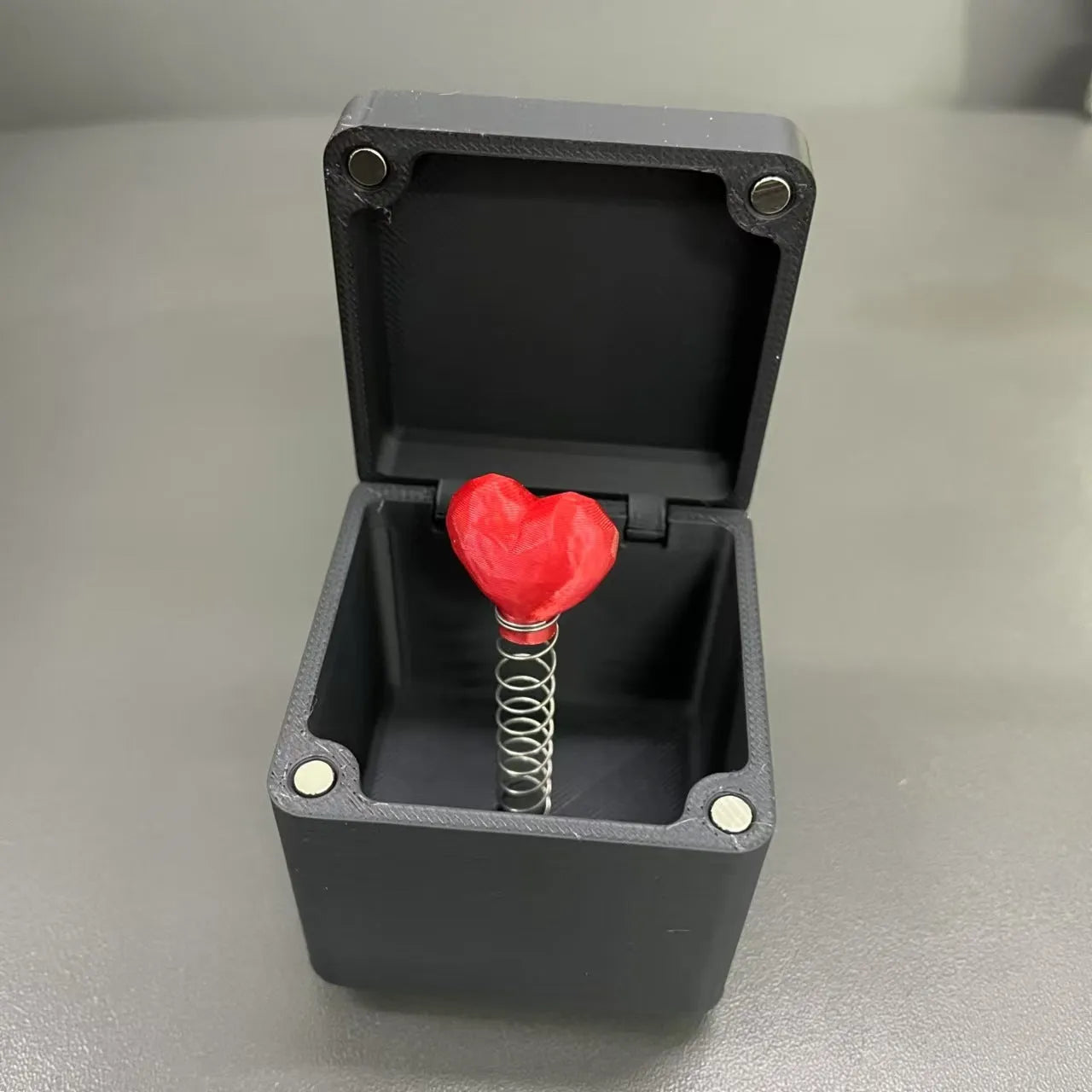 Christmas spoof middle finger gift box, 5x5cm plastic novelty toy in multiple colour options