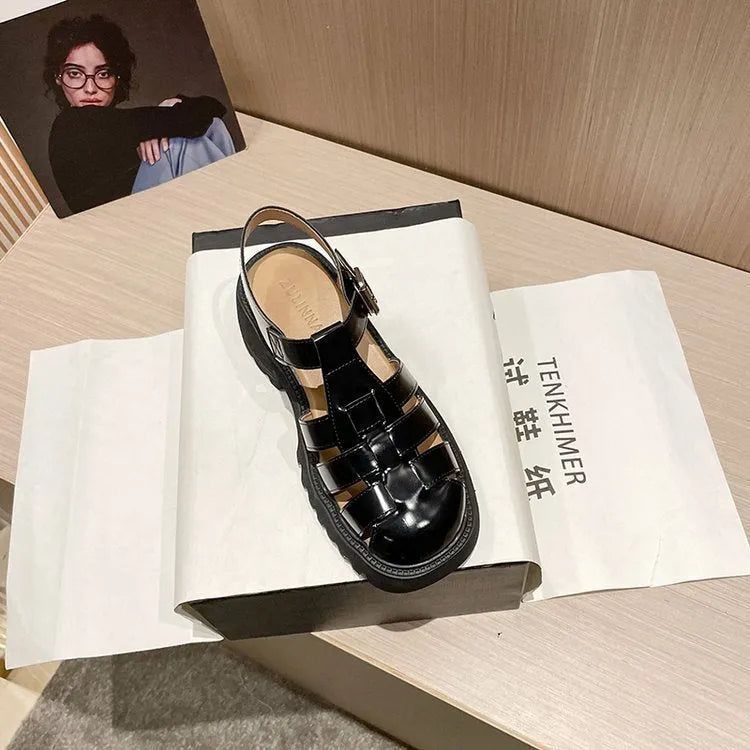 Women's retro platform sandals with chunky heel, closed round toe, and buckle strap in black and beige.