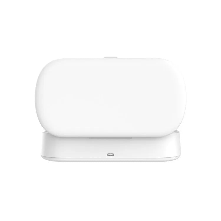 White UV sterilisation box with wireless charging for mobile phones and small personal items.