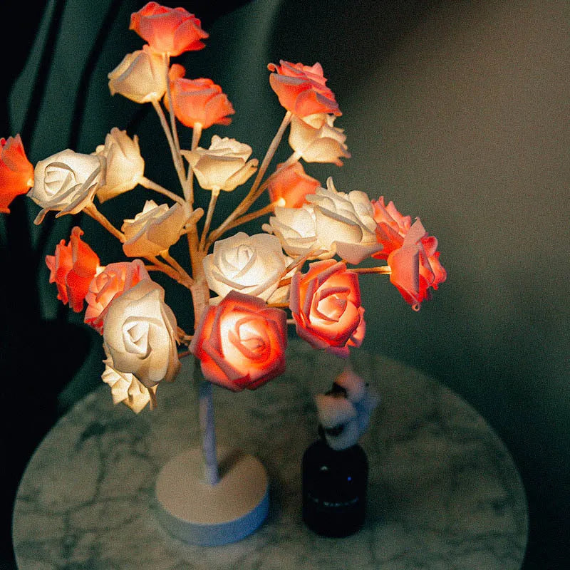 White and red rose flower LED table lamp with warm white lights on wooden surface