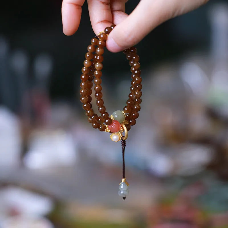 Brown jade Hetian jade three-ring bracelet with silver butterfly and gourd charms