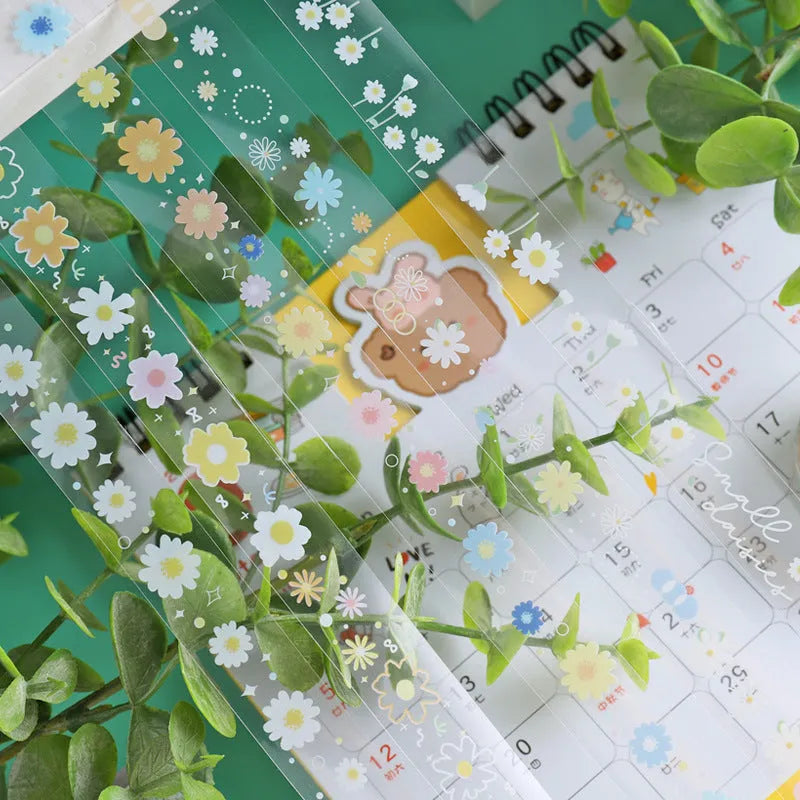 Transparent adhesive tape with Midsummer Daisy cartoon decoration measuring 1.5cm wide