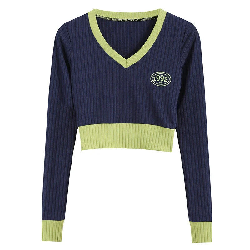 Slim-fit V-neck knit sweater in dark blue with letter pattern and embroidery details