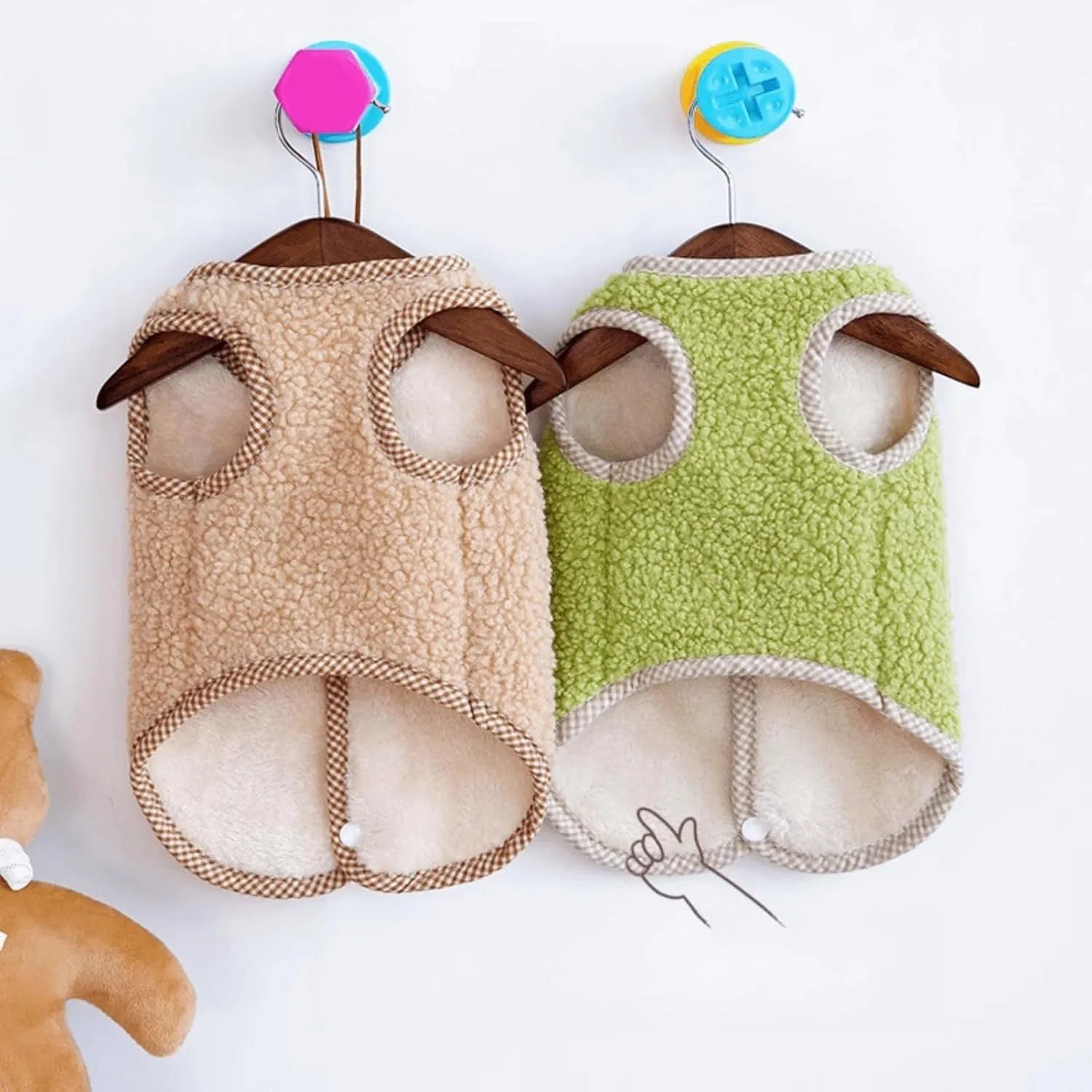 Green thickened coral fleece dog vest with leash ring on a small dog