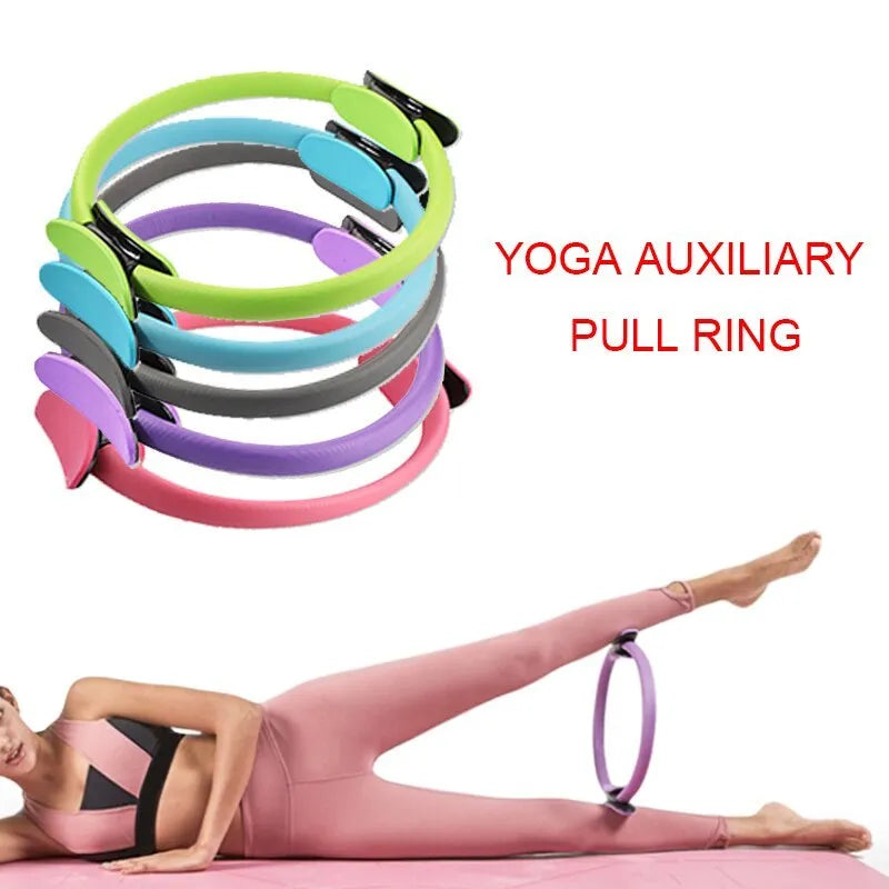 Pink Pilates ring with ergonomic curve on floor for core strength and posture exercises