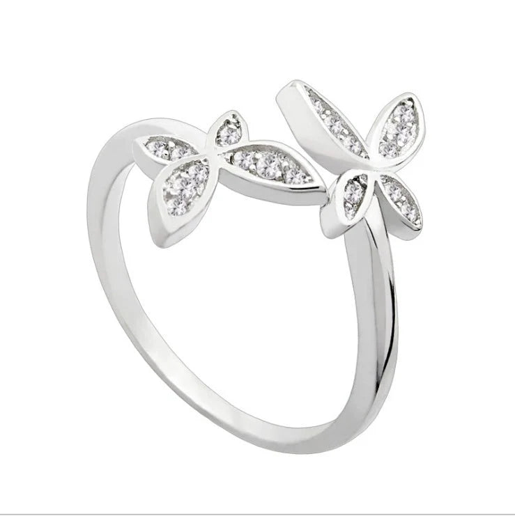 Adjustable sterling silver butterfly ring with sparkling gem settings