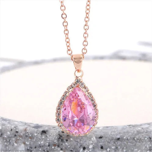 Women's alloy drop necklace with geometric rhinestone pattern in pink rose gold colour