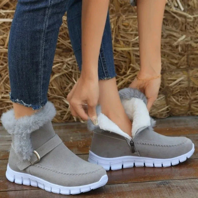 Plush snow boots with suede upper, rubber sole, and artificial fur lining for women's winter wear