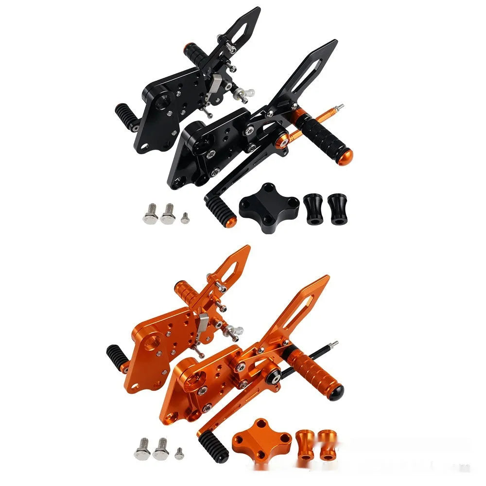 KTM DUKE motorcycle raised footrest relocation kit in black and orange colours