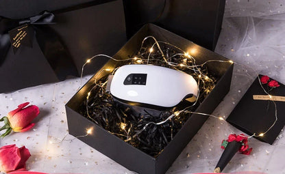 Bluetooth Music Eye Massager with air pressure and hot compress features in a compact leather case