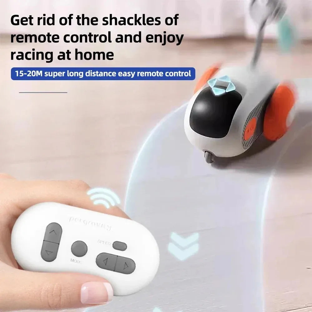 Smart electronic cat toy car with feather attachment on hard floor