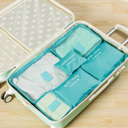 Durable waterproof packing cubes in various colors for organized, efficient travel