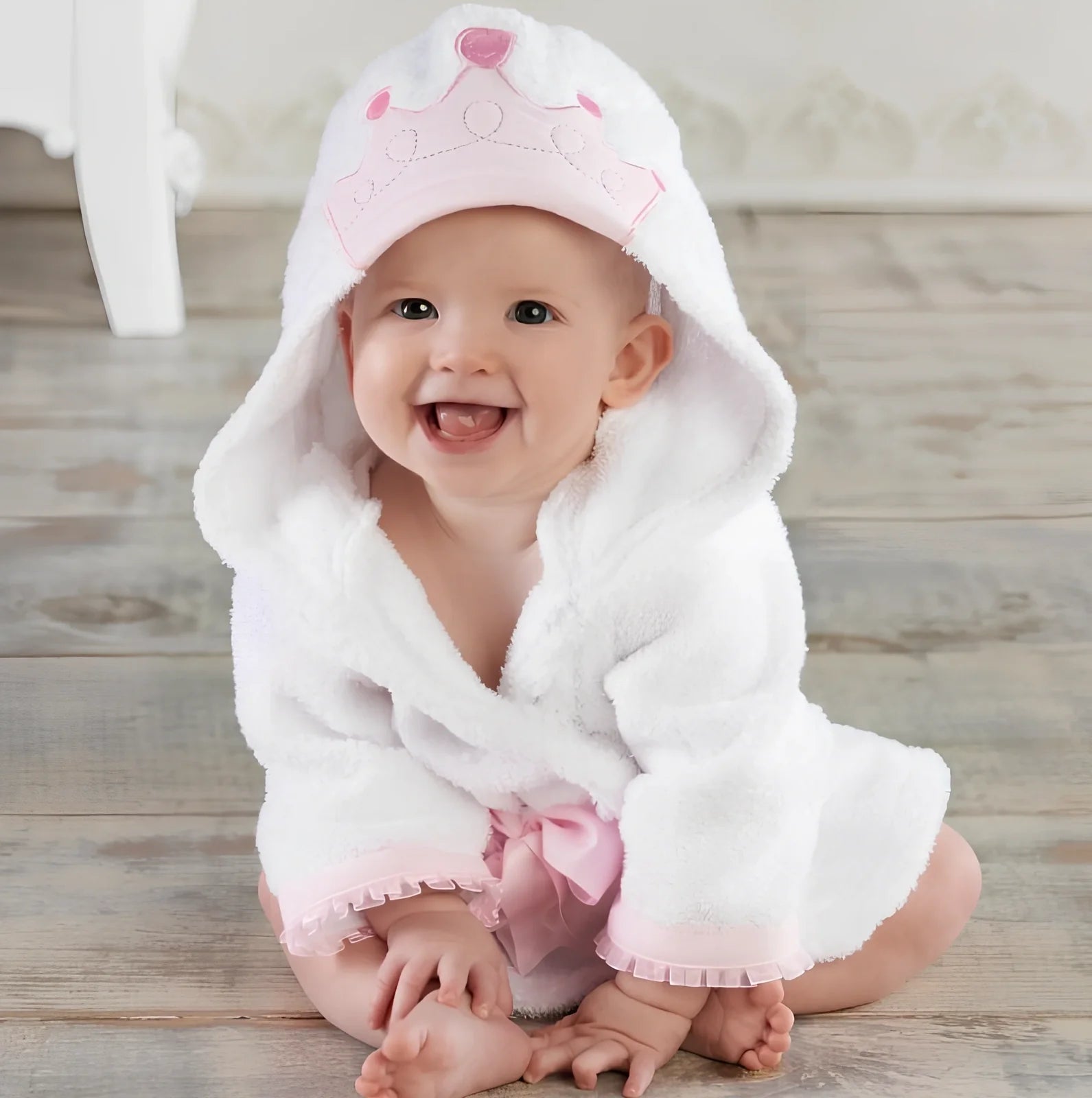 Cotton baby bathrobe with animal hood showing panda design, belt fastening, and absorbent fabric