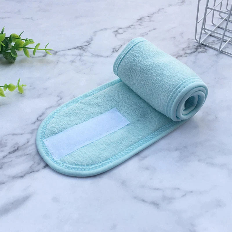 Soft polyester beauty headband for hair control during makeup, sports, and yoga.
