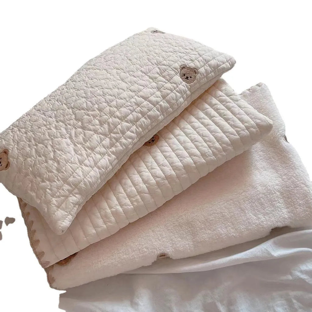 Square removable washable dog bed set with pillow, mattress, and comforter in simple bear design.
