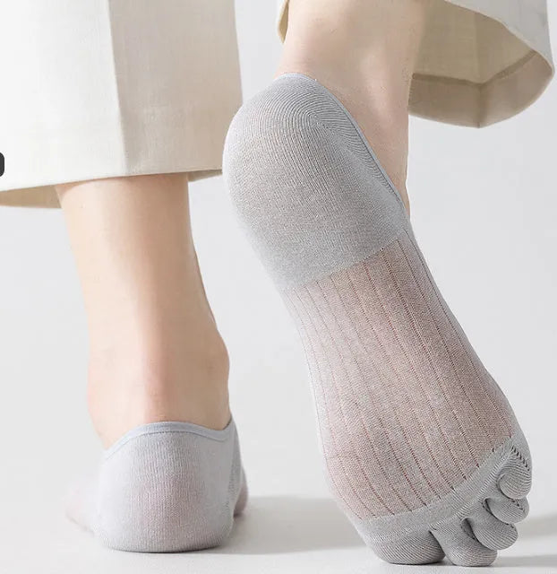 Modal cotton five-finger boat socks in black colour showing ultra-thin construction and toe separation.