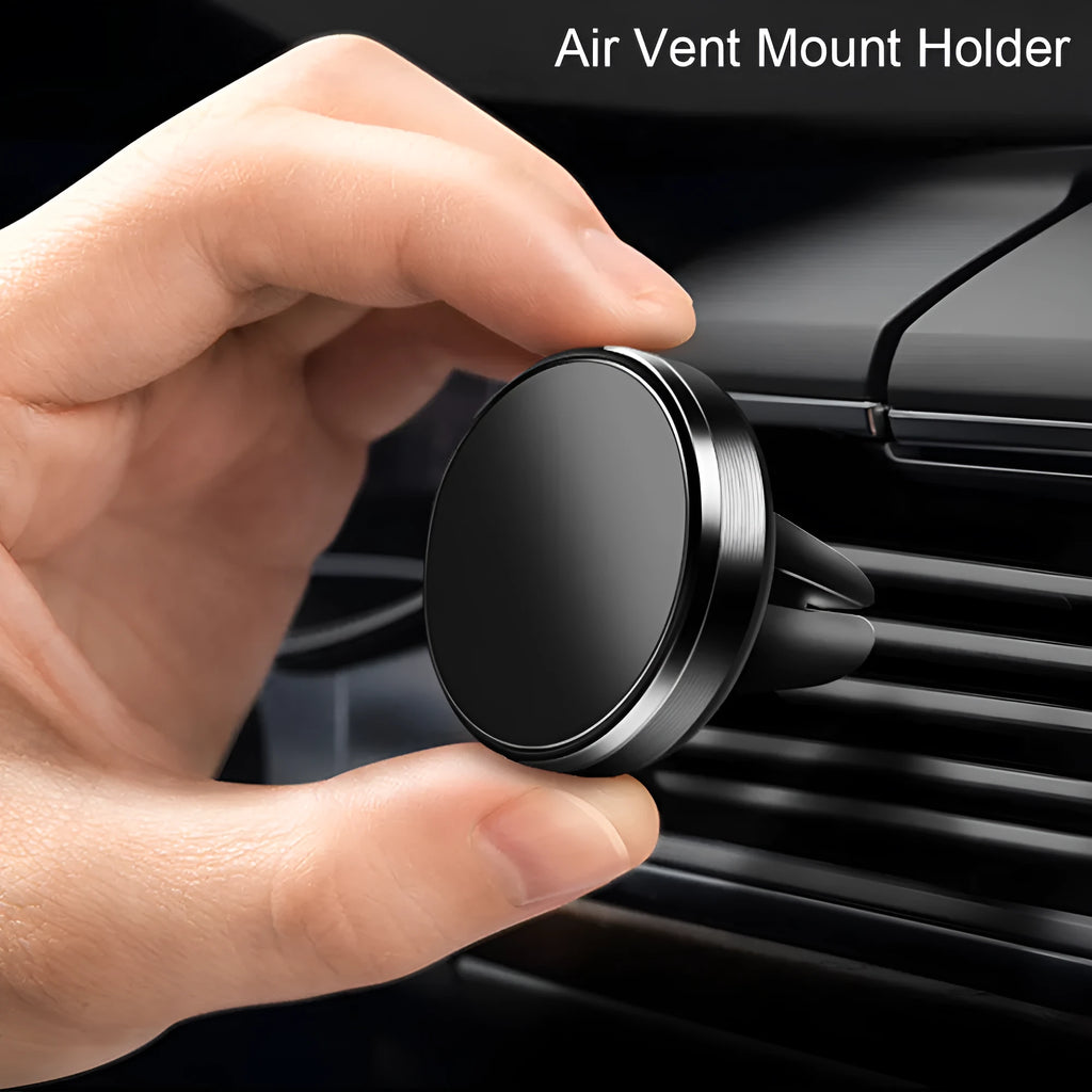 Rotating car magnetic phone holder in black on a dashboard air vent with a smartphone attached