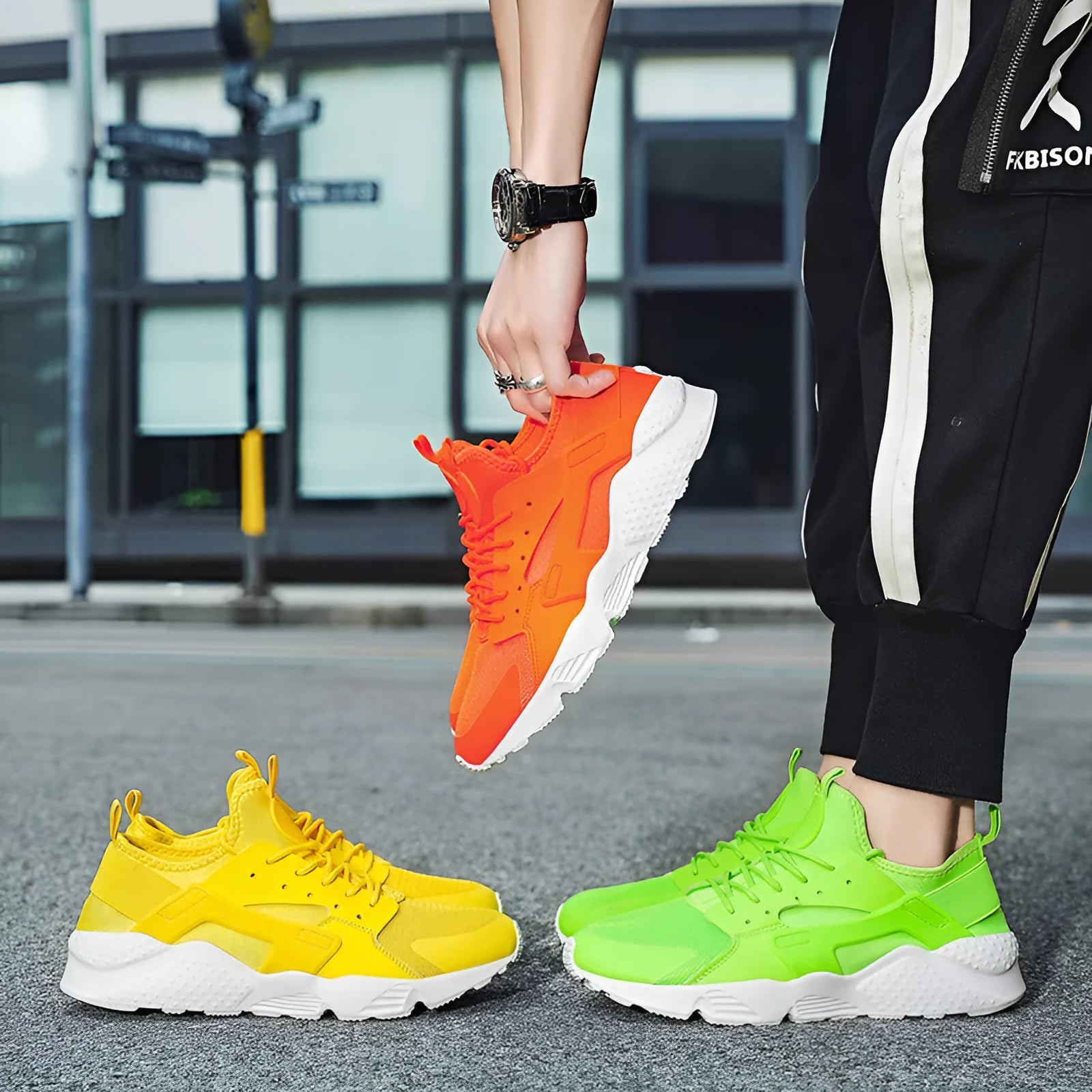 Men's fluorescent red mesh low top casual shoes with cross strap and white lace-up front on a flat MD sole.