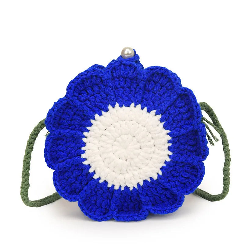 Round hand-woven wool bag with crocheted flowers, cotton lining, and mobile phone pocket