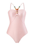 Women's solid colour nylon one-piece swimsuit with hollow gem sling detail, available in multiple colours and sizes S to XL.