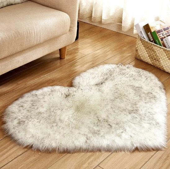 Soft, plush heart-shaped rug in various colors and sizes for comfortable home decor