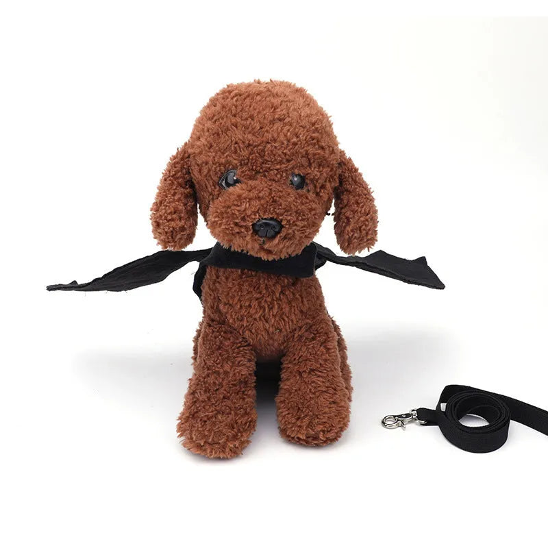 Black polyester bat wings costume accessory for a dog on chest and back.