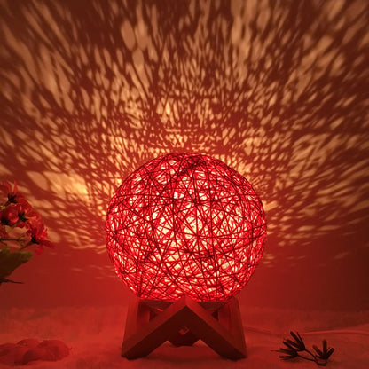 LED rattan table lamp with hand-knit lampshade in various colours