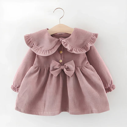 Baby girl cotton corduroy dress with bow detail in multiple colour options