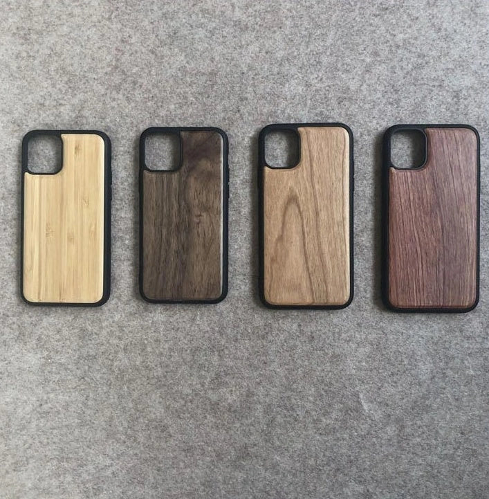 Wooden mobile phone case showing natural grain texture with iPhone 15 compatibility